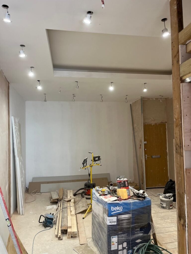 Bournemouth flat renovation in progress with new ceiling and lighting