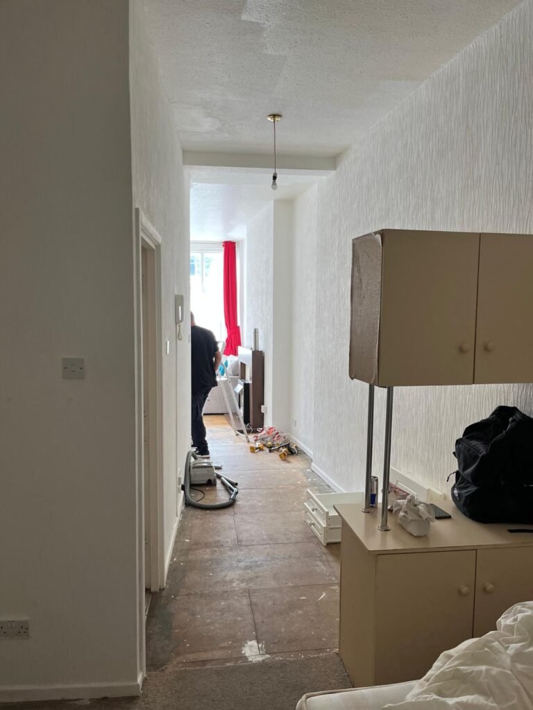 Before renovation, run-down Bournemouth flat with original narrow kitchen