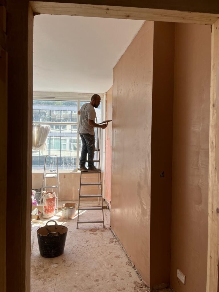 Decorating and finishing work during a full flat refurbishment
